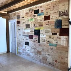 a wall made out of wine corks in a room with tile floors and walls