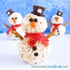 three snowmen made out of rice krispy treats