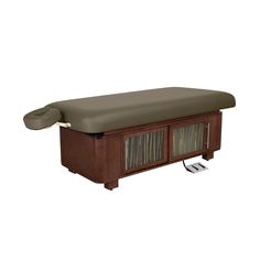 a large wooden bench with a cushion on it's back and two drawers underneath