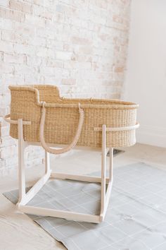 an empty basket sitting on top of a wooden stand