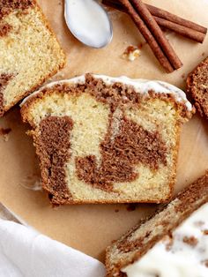 slices of cinnamon swirl bread with icing and cinnamon sticks