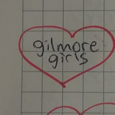 two hearts with the words gilmore girls written in black ink on a piece of paper