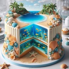 an ocean themed cake with seashells and starfish on the bottom, surrounded by shells