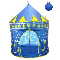 a blue and yellow play tent with stars and moon designs on the top, next to a ball