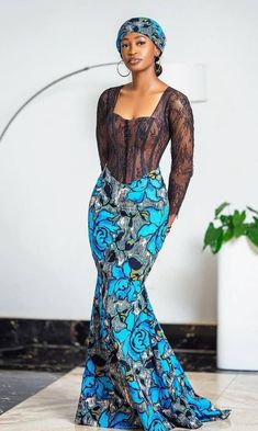 Here's a lovely and Unique Corset dress for you, perfect for special occasions like, formal occasions, weddings, birthday party and other events.  Made with 100% African Wax cotton.  This piece can be made in other prints, kindly contact Us for fabric options. Measurements needed: -Burst -waist -hip -thigh -height -Shoulder -Sleeve length Care instructions:  Wash with mild soap. Do not bleach. Do not machine wash Elegant Long Sleeve Corset Dress For Prom, Blue Lace Party Corset Dress, Blue Lace Corset Dress For Party, Fitted Blue Ankara Maxi Dress, Lace Fitted Maxi Dress For Prom, Fitted Lace Maxi Dress For Prom, Black Ankara Party Dress, Black Ankara Fabric Party Dress, Fitted Lace Maxi Dress With Sweetheart Neckline