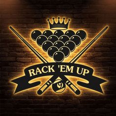 rack em up neon sign with pool balls and cues on brick wall in dark room