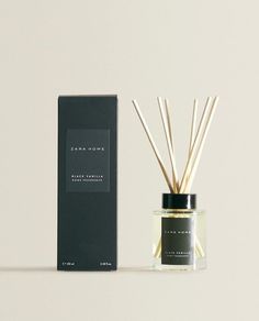 an image of a reed diffuser next to a box