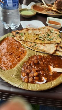 several plates of food sitting on a table