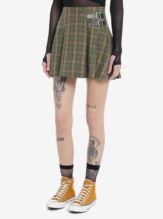 Fall is the perfect time for earth tones  so grab this green and brown plaid mini skirt with faux leather buckles on one hip.100% cottonWash cold; dry lowLength: 16"ImportedListed in junior sizesModel is 5'10"Model wears size Small Green Skirt Outfits, Cutesy Outfit, Tall Hoodies, Plus Size Fits, Plaid Mini Skirt, Fall Skirts, Brown Plaid, Socks And Tights, Plaid Skirt