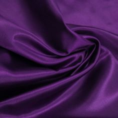 Charmeuse Satin Fabric by the yard, bolt, or wholesale. This Eggplant charmeuse silk fabric has a very soft hand and a silky feel. It is light in weight and has beautiful drape that makes it perfect for dresses, special occasion apparels, and gowns. It is also often used for intimate apparels, robes, and pajamas. Size: 1 Yard.  Color: Purple. Tutu Craft, Chic Peas, Wedding Apparel, Crafts Decor, Purple Satin, Fabric Bolts, Beautiful Drapes, Tulle Fabric, Textured Knit