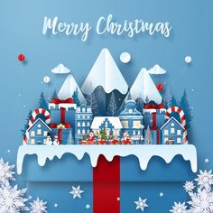 a blue christmas card with snowflakes and buildings