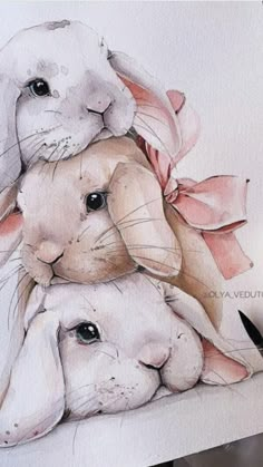 a watercolor drawing of two rabbits hugging each other with a pink bow on their head