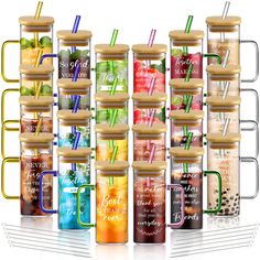 there are many different types of drinks in the bottles with lids and straws on them