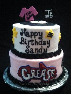 a three tiered cake with the words happy birthday sandy on it's side