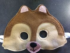 squirrel mask in felt and sequin fabric. Elastic attachment approximately 30 cm. Squirrel Mask, Angers France, Sequin Fabric, Kids Costumes, Etsy App, Selling On Etsy, Sell On Etsy, Gender Neutral, Sequin