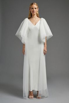 Style: CapeDesign: PlainFabric: MeshSleeve Length: 3/4 Sleeve Bridal Cape Sleeves, Tule Cape, Bridal Slip Dress, Bridal Dresses Vintage, Coast Fashion, Layered Sleeves, Tulle Cape, Cape Coast, Cape Fashion