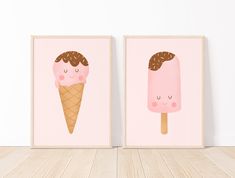 two pink ice cream posters with chocolate sprinkles on them against a white wall