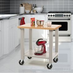 a kitchen island with a mixer on it