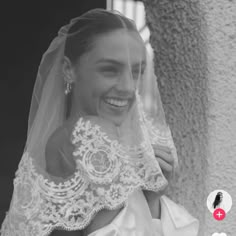 a woman in a wedding dress smiling and wearing a veil over her head with the words,