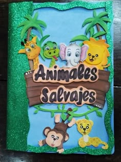 an animal book with animals on it and the words, animals salvaies written in cursive writing