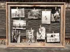 an old wooden frame with photos pinned to it