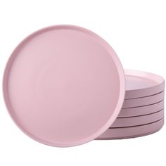 pink plates stacked on top of each other