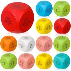 several different colored dices with words written on them