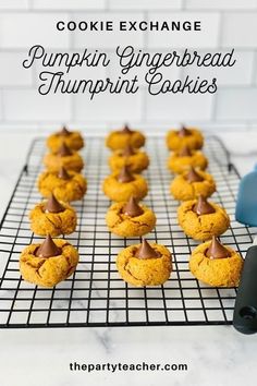 pumpkin gingerbread thumbprint cookies on a cooling rack