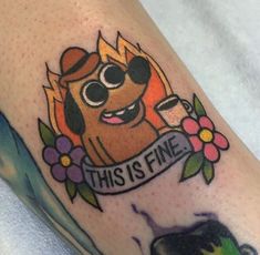 this is an image of a tattoo on someone's leg that says, this is fine