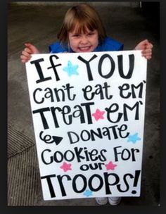 two girls holding up a sign that says if you can't eat my treat, then don't cook for