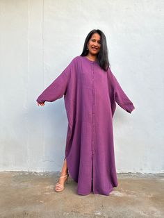 Top Rated Kaftans by Oprah Daily, Byrdi, Cosmopolitan, Elle, and more...  MALA handworks shirtdress is different - quality, crinkle stitched, double gauze cotton fabric that gets so soft. Generously sized - one size fits most - is very livable and made for wearing at home. And away from home. Wide sleeves can be easily rolled to your favorite length, quality front buttons and two front pockets. SIZE & FIT INFORMATION * All measurements are flat * Bust/ Waist/ Hips 38 in (Circumference 76 in.) * Oversized Long Shirt Dress For Daywear, Casual Long Sleeve Shirt Dress For Loungewear, Casual Long Tunic With Relaxed Fit, Oversized Long Tunic For Daywear, Long Sleeve Cotton Kaftan With Relaxed Fit, Oversized Short Sleeve Tunic For Loungewear, Casual Purple Tunic Kaftan, Oversized Long Button Shirt Dress, Cotton Relaxed Fit Shirt Dress For Loungewear