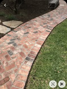 an image of a brick walkway in the yard