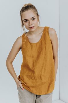 Ersa - women's linen tank top made of soft and washed 100% linen. DETAILS: ♥ 100 % European linen fabric (Oeko-Tex certified), medium weight (185 g) ♥ Perfect for summer: breathable, loose, comfy ♥ For work & for casual wear ♥ Custom measurements can be applied ♥ 25 COLORS to choose ♥ Machine washable ♥ No need to iron - for a relaxed look Please check MORE similar linen tops for women here: https://etsy.me/3t9W6ql https://etsy.me/3qzqgl3 https://etsy.me/3rEDdeG ----------------------------- Linen Shirts Women, Shirt Linen, White Linen Shirt, Girls White Dress, White Flower Girl Dresses, Linen Summer, Linen Tank Top, Summer Linen Dresses, Linen Tank