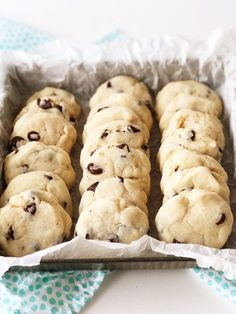 chocolate chip cookies in a pan on a blue and white tablecloth with text overlay