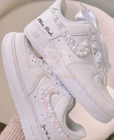 -This is a custom Bridal sneaker.  -Option 1 is only Name and date -Option 2 has pearls on the outer 2 swooshes and names and dates. -Offers more designs and colors of pearls/check out my store/ -Open for custom requests. TURNAROUND TIME: -2 weeks to be crafted just for you -Shipping will take an additional 3-7 business days. -We offer FREE shipping within the US. -EXPEDITED service available Visit the link below for EXPEDITED SERVICE: https://perfctpairings.etsy.com/listing/1537883783 for PURCH Sneaker Wedding, Sneakers Bride, Color Changing Shoes, Sneakers For Bride, Wedding Bride Shoes, Wedding Sneakers For Bride, Sneakers Wedding, Bride Sneakers, Custom Wedding Shoes