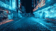 an abstract photo of a city street at night with blue and red lights on the buildings