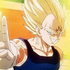 a young gohan is making the peace sign with his hand