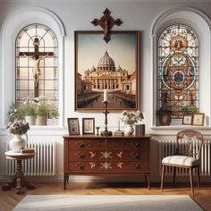 a room with stained glass windows, a painting and an antique dresser in the foreground