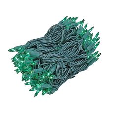 green christmas lights on white background with clippings for stringing or lighting up