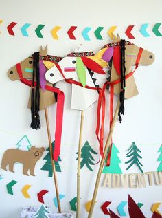 the horse is made out of paper and sticks