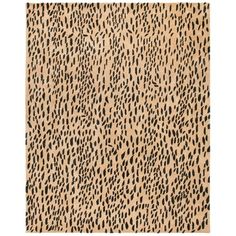 an animal print rug with brown and black spots