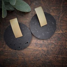 Boho Black & Gold Circle Cork Earrings, the color is a very beautiful black. These are a part of Red Shed Designs’ Cork Collection. These are very trendy, lightweight and truly unique earrings. This earring is made from natural cork and measures approximately 1 1/2". Red Shed Designs creates unique hand-crafted Boho inspired jewelry pieces to make a bold statement. Each piece is handmade, and due to the nature of materials, each piece has slight variances, the shades of material are all-natural Shed Designs, Cork Collection, Red Shed, Cork Earrings, Wooden Accessories, Shed Design, Gold Circle, Light Weight Earrings, Circle Earrings