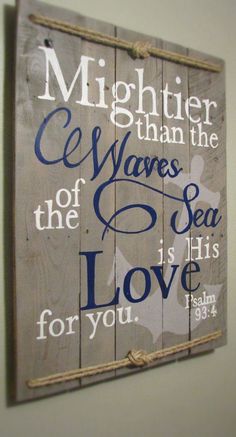 a wooden sign that reads, mightier than the waves of the sea is his love for you