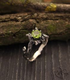 Peridot twig engagement ring with leaves, Topaz on branch ring, Silver ring with topaz, Women's silver ring, Unique topaz ring for woman ■ All wedding rings are only crafted with the finest of recycled metals DETAILS: Main stone - 7mm natural Peridot Additional stones - 1,5mm Cubic Zirconia Metal - Sterling Silver 925 Dimensions - width 10mm (0,393), band width - 3mm (0,118 in.) Finish - oxidized (shiny at your request - shown in the last photo) Please choose your ring size and gem in menu while Nature-inspired Hand Forged Promise Ring, Engagement Ring With Leaves, Ring With Leaves, Character Jewelry, Fairy Glitter, Branch Engagement Ring, Witch Rings, Twig Engagement Ring, Earthy Wedding