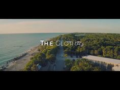 an aerial view of the ocean and trees with the words the flora on it in white