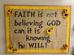 a bulletin board with sunflowers and the words faith is not believing god can it's known he will