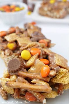 a white plate topped with lots of candy bars