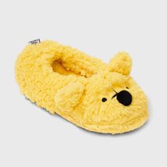 Lounge the way you like in the Women's Disney Winnie the Pooh Slippers in Yellow. With a lightweight design, these slippers are easy to wear and won't weigh you down as you move around in your space. The insole is made of soft and cozy polyester material, providing ultimate comfort for your feet. The added polyester lining further ensures a snug fit. The closed-toe design keeps your feet warm with a flexible outsole that's designed for extra freedom of movement all day. Fun Synthetic Slippers For Indoor Use, Fun Synthetic Indoor Slippers, Fun Indoor Synthetic Slippers, Playful Indoor Synthetic Slippers, Winnie The Pooh Shoes, Yellow Slippers, Comfy Slippers, Disney Food Blog, Disney Food