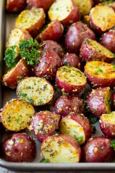 red potatoes with herbs and seasoning on top