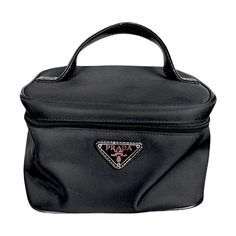 Prada Cosmetic Bagsimple & Stylish Vintage Beauty. Perfect For A Minimalist Vibe Or To Add A Chic Touch To Your Daily Essentials. : Gender: Women Color: Black Item#: Pra956493 : Height: 6.25” Inches () Width: 8” Inches () Depth: 6.75” Inches () Prada Travel Bag, Elegant Portable Black Cosmetic Bag, Compact Black Cosmetic Bag, Luxury Black Rectangular Cosmetic Bag, Prada Cosmetic Pouch, Vanity Case, Daily Essentials, Travel Cosmetic Bags, Woman Colour